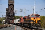 Manifest rolls east off the bridge